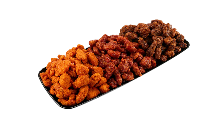 A massive 50-piece family wing bucket, ideal for group catering and gameday events in Houston.
