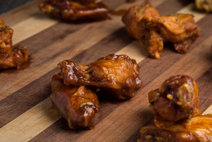 Six pieces of golden, crispy KBBQ wings, a perfect side or snack for local diners.