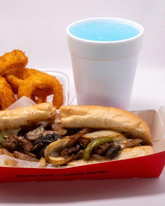 Chimac Cheesesteak Combo: Served with a side and your choice of drink.