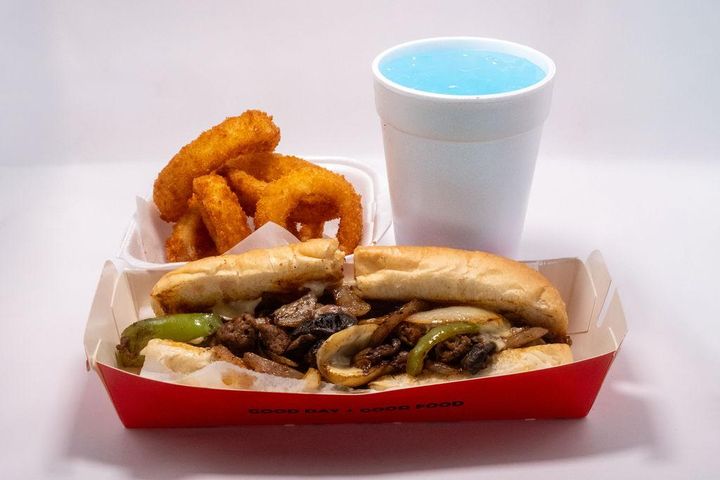 A traditional steak Philly cheese sandwich served on a fresh toasted sub roll.